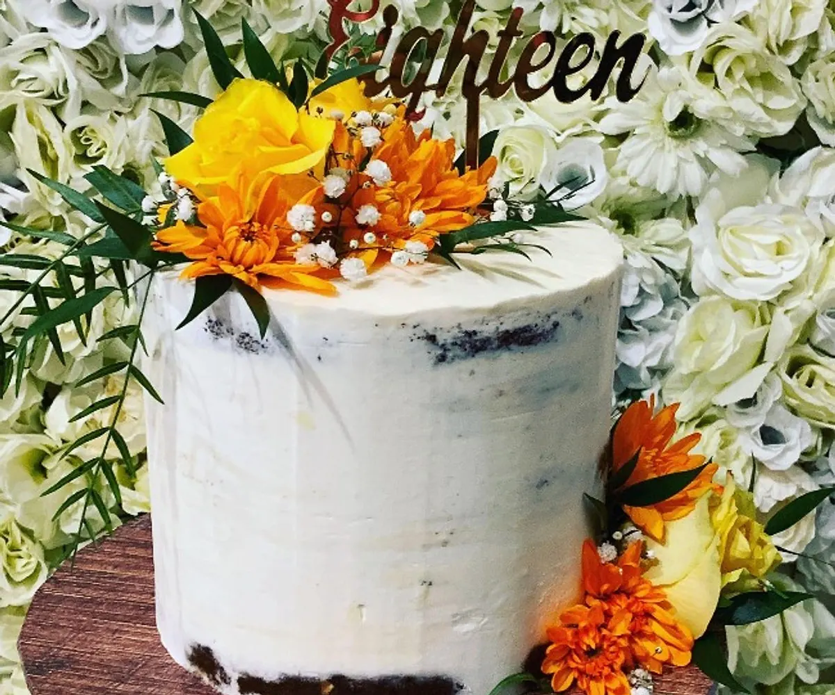 orange and yellow flower cake