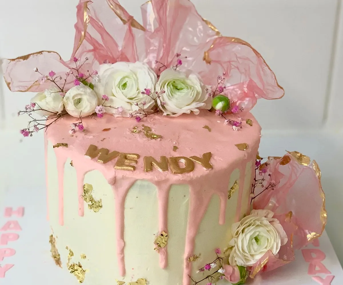 Pink and gold sails cake