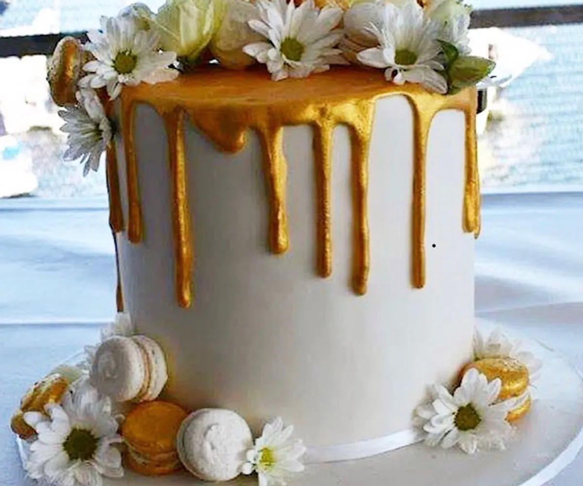 Gold and white engagement cake