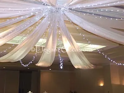 White Ceiling Decor for Fabric and Lights on Ceiling.