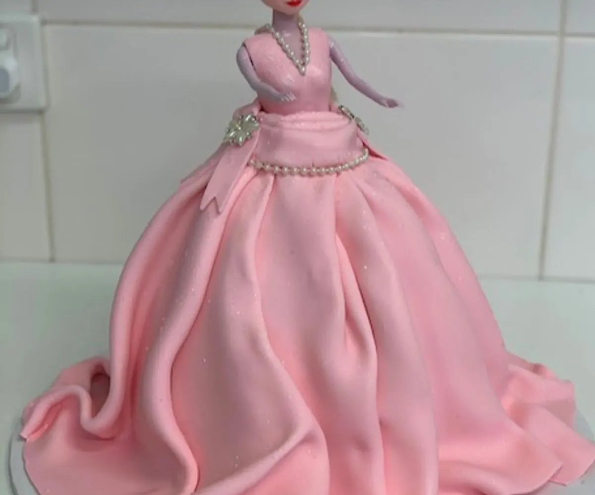Pink doll cake