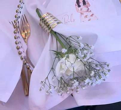 Gold beaded charger plate styled in a formal place setting