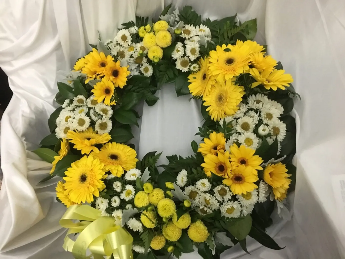 Modern Funeral Wreath for spring mix of yellows funeral wreath