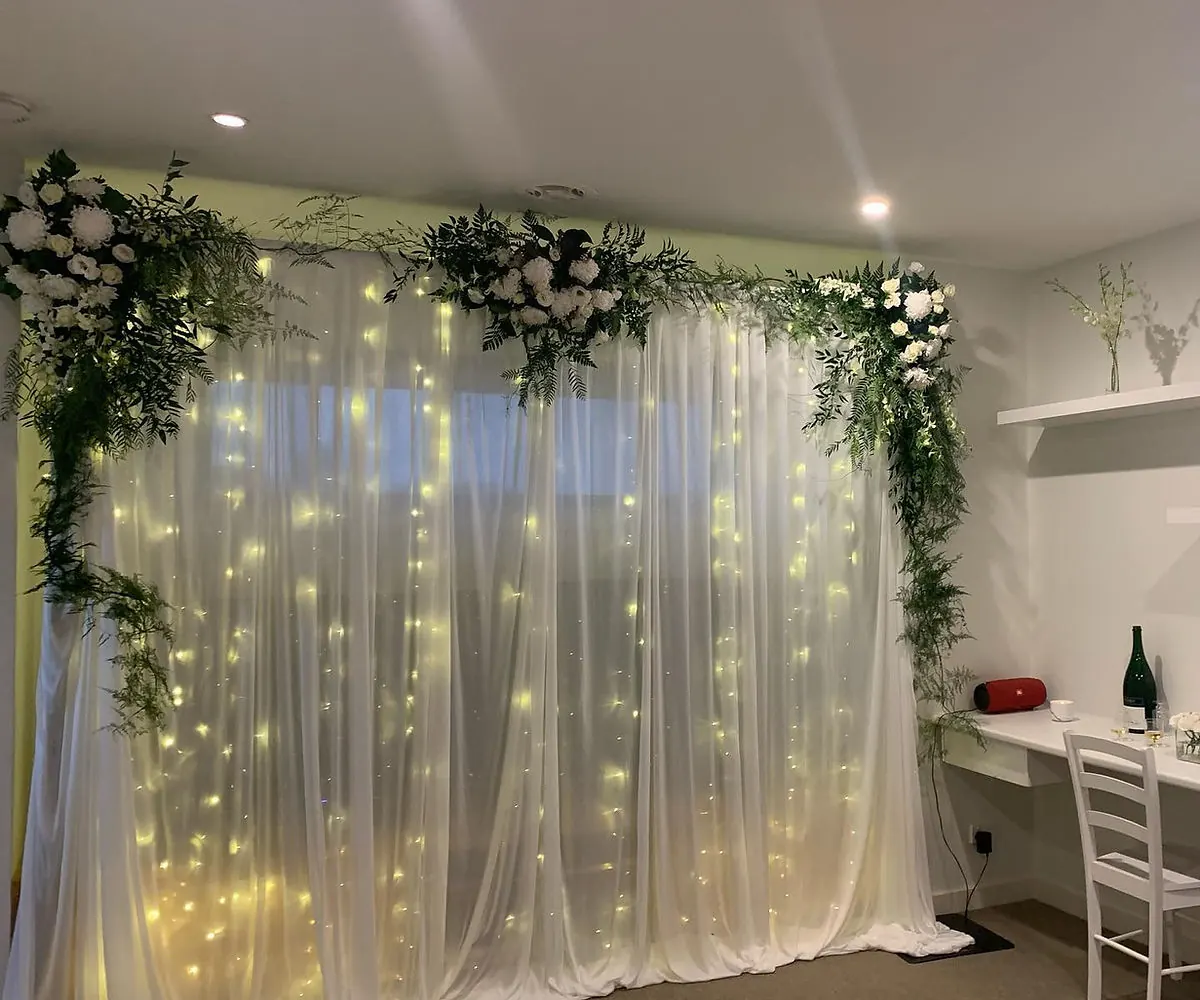 Floral backdrop arch