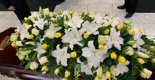 casket flowers- yellow and white