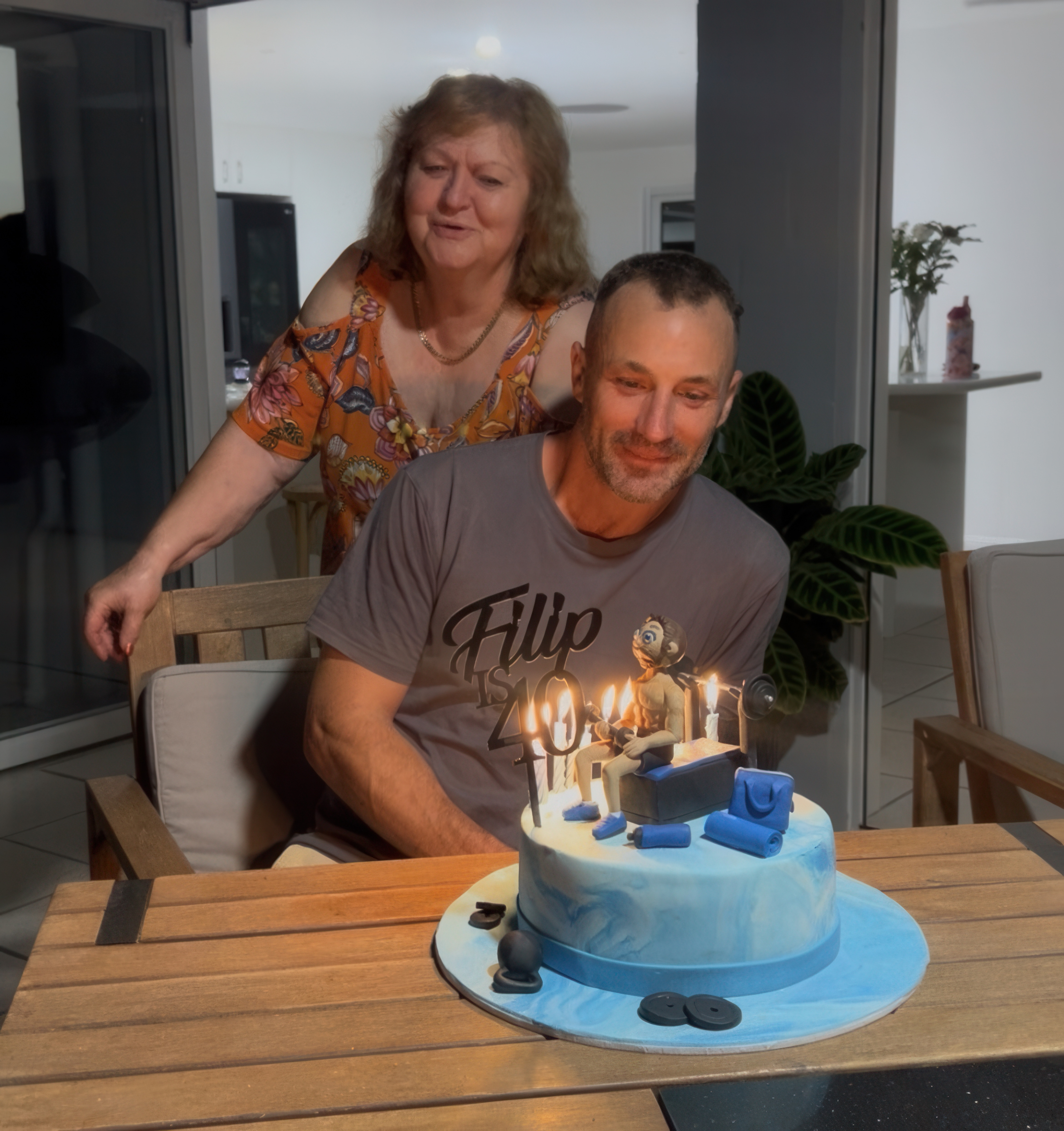 Jelka Jurinovic with family and a milestone cake